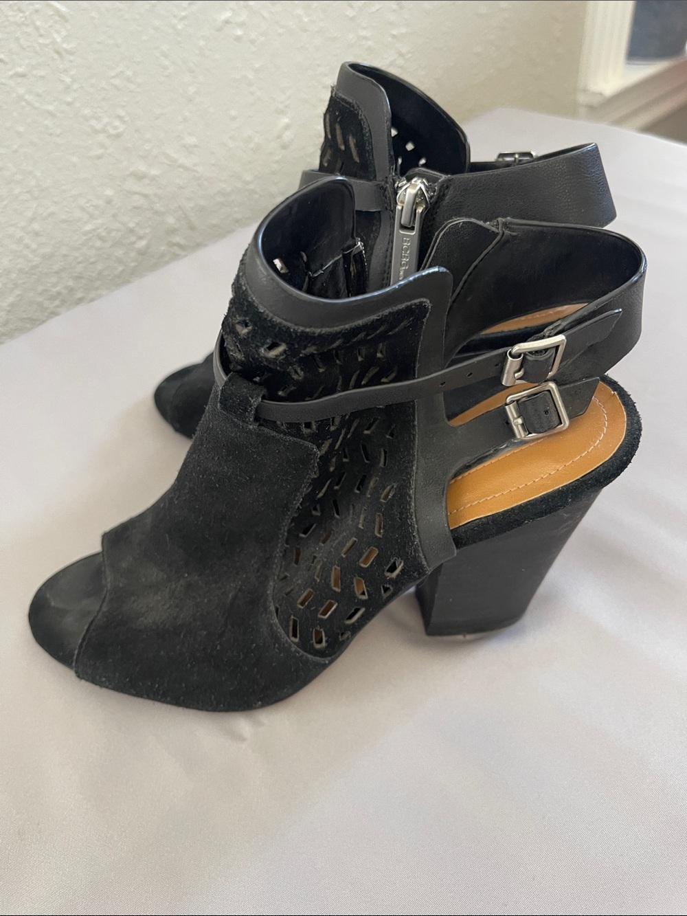 BCBGeneration Black Laser-Cut Peep-Toe Buckle Booties